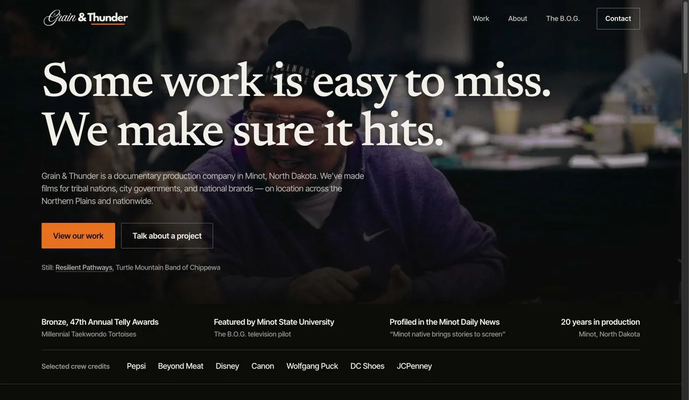 The Grain and Thunder homepage: a full-bleed documentary still behind a large serif headline