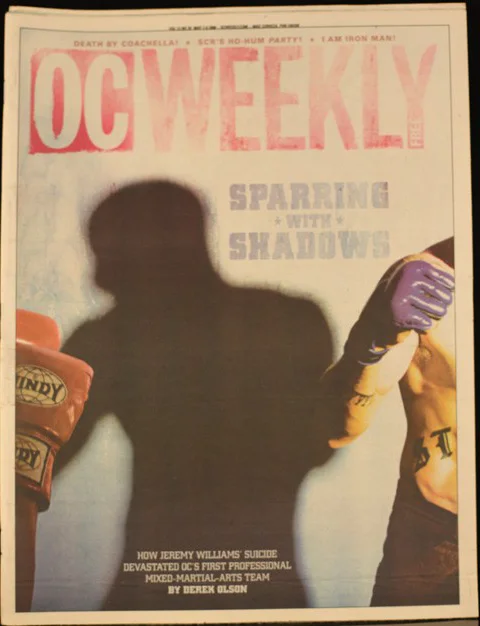 OC Weekly cover: the shadow of a fighter between two gloved hands, with the headline Sparring With Shadows